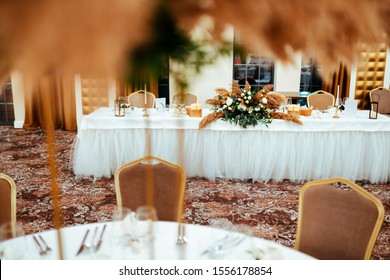 Boho Style Wedding Decoration In Light Colors, Decorated With Pampas Grass