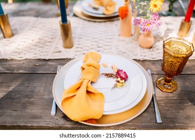 Boho Wedding Table Set. Vintage Dining Table With Decorations, Flowers And Pampas Grass Boho Style. Table Set For An Event, Party, Date Or Wedding.