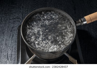 Boil water in an iron pot