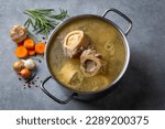 Boiled bone and broth. Homemade beef bone broth is cooked in a pot on. Bones contain collagen, which provides the body with amino acids, which are the building blocks of proteins.