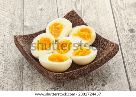 Boiled chicken egg for breakfast without eggshell in the bowl