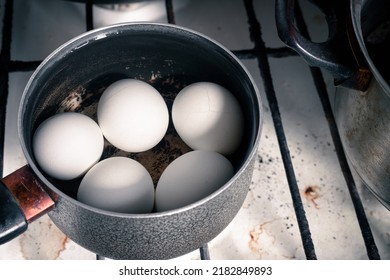 Boiled Chicken Eggs In A Small Saucepan