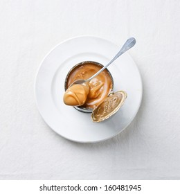 Boiled Condensed Milk In Can On White