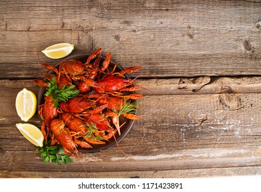 Boiled Cooked Crayfish Crawfish Ready To Eat Onold Rustic Wooden Background. Copy Space. Overhead. Top View.