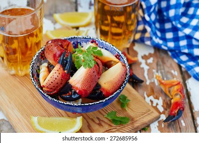 Boiled crab claws and beer