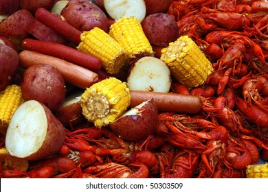 Boiled Crawfish With Corn, Potatoes And Hot Dogs.