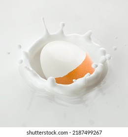 Boiled Egg Without Shell Falls Into Milk, Yoghurt, Sour Cream, Splash