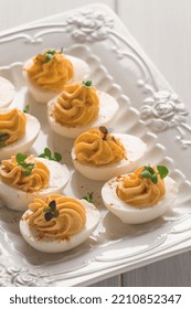 Boiled Eggs Stuffed With Yolk With Mayonnaise, On A White Plate, Selective Focus, Blurry, Close-up, No People,