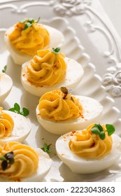 Boiled Eggs Stuffed With Yolk With Mayonnaise, On A White Plate, Selective Focus, Blurry, Close-up, No People,