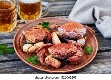 Boiled red stone crabs.