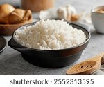 boiled rice in grey bowl on kitchen table