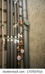 Boiler Room Of An Apartment Building With Pipes And Metering Devices