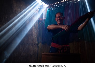 Boiling the flax tree is the first step before dyeing it into different colors to weave mats. One of the occupations and way of life of rural villagers in Thailand.