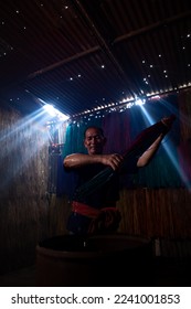 Boiling the flax tree is the first step of dyeing into different colors to weave mats. One of the occupations and way of life of rural villagers in Thailand.