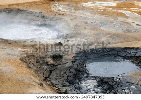 Boiling mud pots in the geothermal area of Iceland