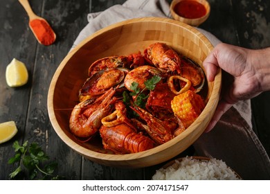 Boiling Seafood - Homemade Southern Crawfish Boil With Potatoes Sausage And Corn
