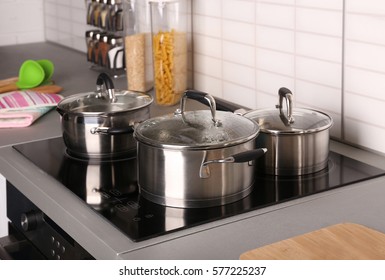 Boiling Water In Pan On Electric Stove In The Kitchen