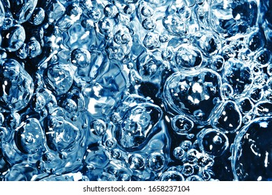 Boiling Water Texture. Blue Fizzy Water Pattern. Air Bubbles Background.