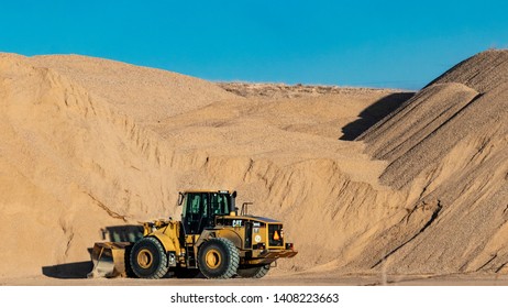 Boise, ID - March 30, 2019: Yellow CAT Bulldozer At Big Quarry Site