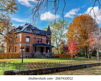 Boise, Idaho, USA –October 30, 2021: Autumn Trees And Classic Old Brisk House In Boise Idaho 