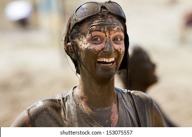 BOISE, IDAHO/USA - AUGUST 11:Unidentified Woman Gives The Camera A Huge Grin At The The Dirty Dash In Boise, Idaho On August 11, 2013 