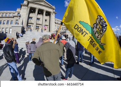 BOISE, IDAHO/USA - FEBRUARY 25, 2017- Man Holds A Tea Party Sign During A Pro Gun Rally At The Idaho Capital Building