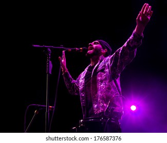 BOISE, IDAHO/USA - FEBRUARY 8, 2013: Sam Harris Of X Ambassadors Puts His Arms Into The Air As He Sings During The Night Visions Tour