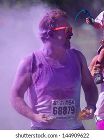 BOISE, IDAHO/USA - JUNE 22: Runner 68879 Covered In Purple At The Color Me Rad 5k In Boise On June 22, 2013