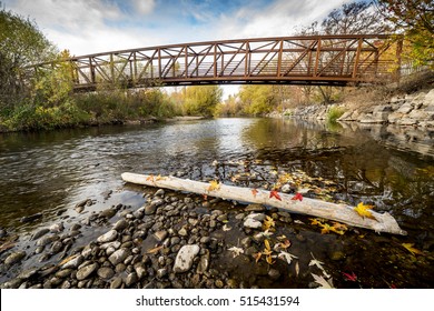 Boise River Bridge With Log And Autumn Leaves