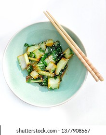 Bok Choy Cooked Chinese Style. Vegan Food Concept. Top View. Seared With Soy Sauce, Sprinkled With Sesame Seeds.