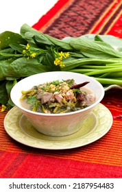 Bok Choy With Spices Soup In Bowl With Red Background