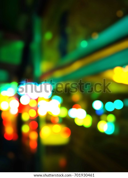 bokeh blur night city lights background raining,\
City night rain cars lights bokeh drops, blure from car light on\
the traffic road