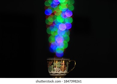 bokeh a cup  in the dark

