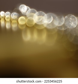 bokeh effect with gold and white orbs