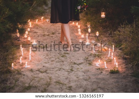 Bokeh. The girl in the lights. Candles