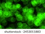 bokeh green orbs light overlay. Focus Bokeh Background. natural green bokeh orbs. graphic design background. Defocused light dots. Green Circular Bokeh on black