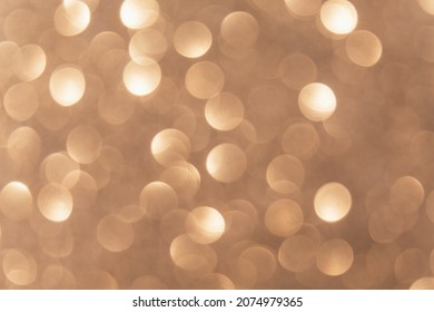 Bokeh light overlay. Circle pattern. Optical lens flare. Flash leak effect. Defocused shiny golden round spots texture glow on blur abstract background.
