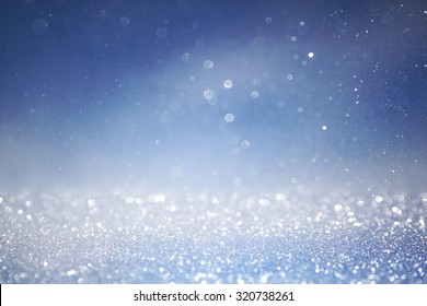 Bokeh Lights Background With Multi Layers And Colors Of White Silver And Blue
