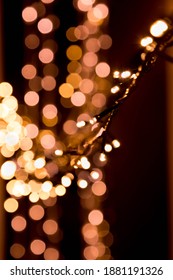 Bokeh Lights Background In Yellow And Lilac Colors On Black. Christmas Lights String Garland, Festive Overlay