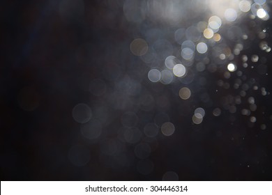 bokeh of lights on black background - Shutterstock ID 304446314