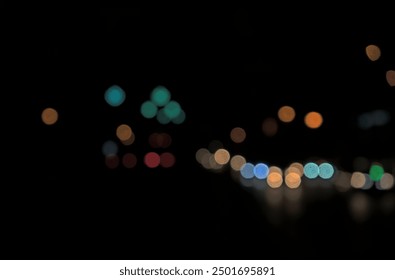 Bokeh of night shot, road, street lights, transportation abstract in city. Beautiful blurry colored lights. Random circular geometry. Horizontal. - Powered by Shutterstock