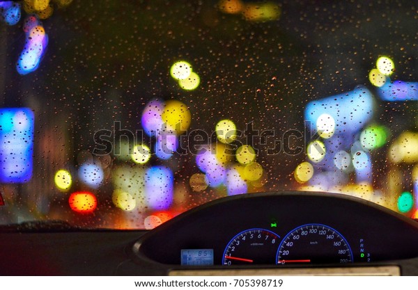 bokeh and rain with car meter , this image may\
contain noise or soft\
focus.