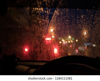 Bokeh Through Window In Car In The Raining Night