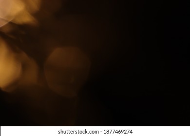 Bokeh Warm Light On Black Background Overlay