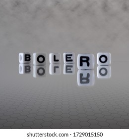 Bolero Dance Style Concept Represented By Black And White Letter Cubes On A Grey Horizon Background Stretching To Infinity