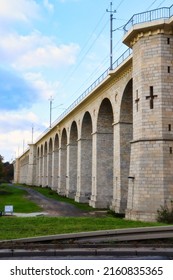 Boleslawiec, Poland - November 10, 2019: Path next to the rail viaduct, a railway bridge over the river Bobr in Boleslawiec, Poland.