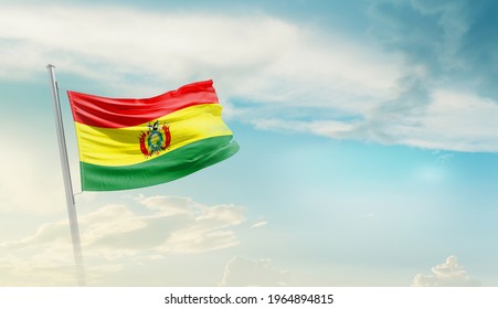 Bolivia national flag waving in beautiful sky. - Powered by Shutterstock