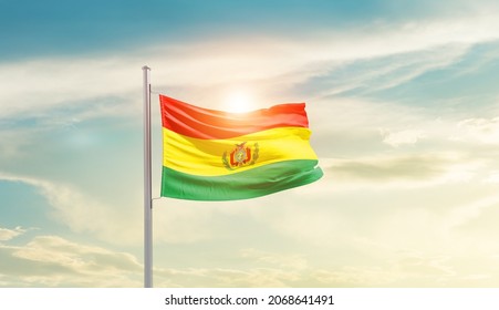 Bolivia national flag waving in beautiful sky. - Powered by Shutterstock