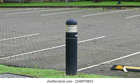 Bollard In A Carpark That Is Also A Light