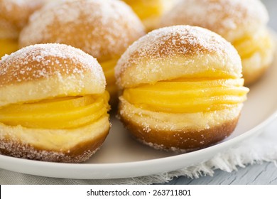 Bolo de Berlim, or "Berlin Balls": Portuguese Fried Dough Rolled in Sugar and Filled With Ovos Moles
